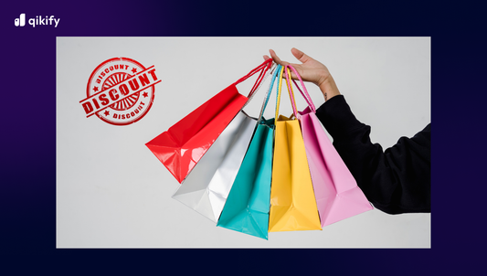 A hand holding large quantity of bag discounts