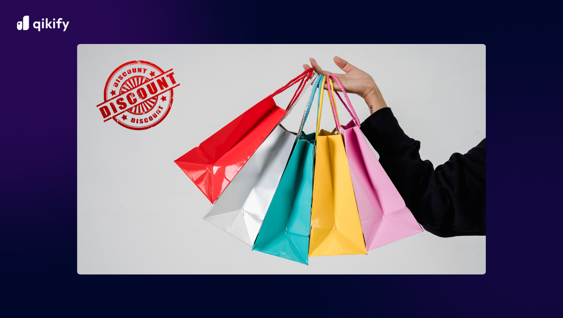 A hand holding large quantity of bag discounts